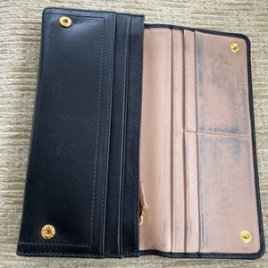 Prada lambskin wallet in black.